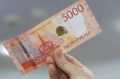 Курьер мошенников выманил у вдовы участника СВО в Омске 4,5 миллиона