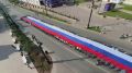 Флаг России развернули на Любинском проспекте